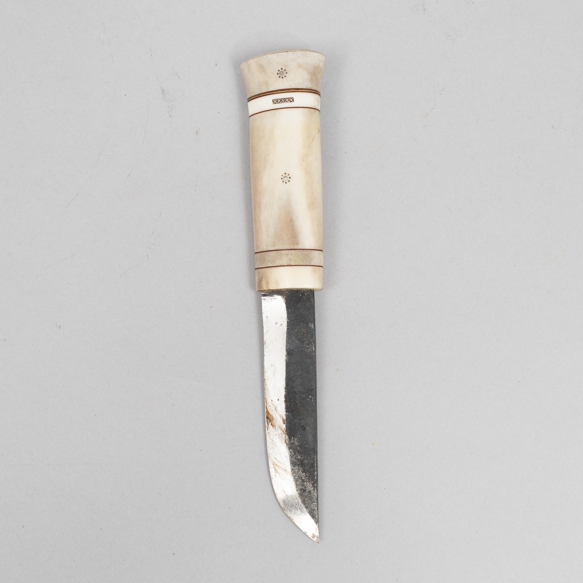 Ingvar Backlund, a reindeer horn knife, signed and dated 99-XX.