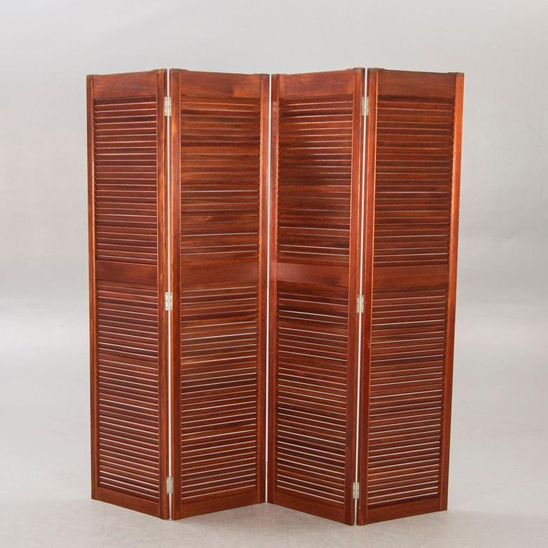 A 21st century stained wood folding screen.