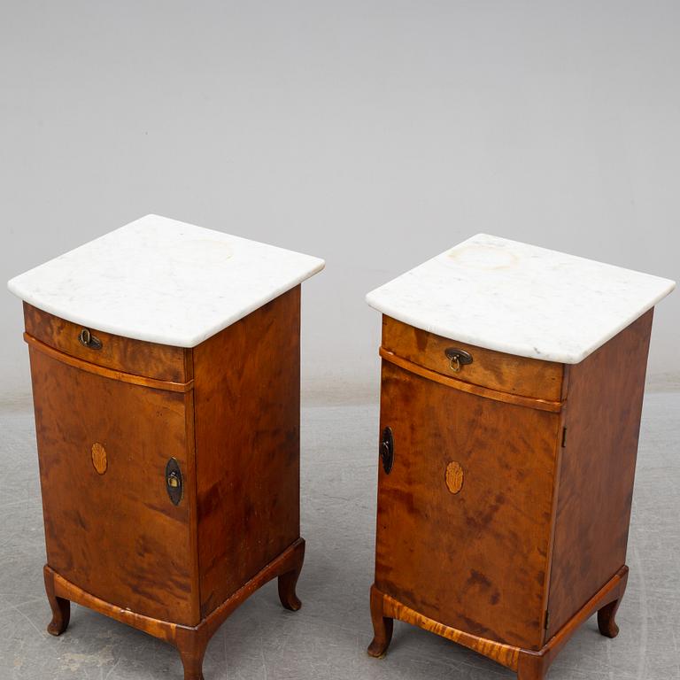 A pair of bedside tables, early 20th century.