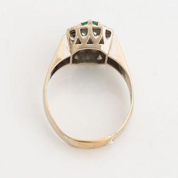 Emerald and diamond ring.