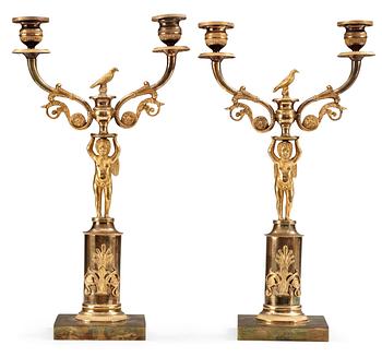 A pair of Swedish Empire gilt bronze two-light candelabra.