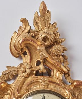 A Swedish Rococo 18th Century wall clock by J. Hovenschiöld.