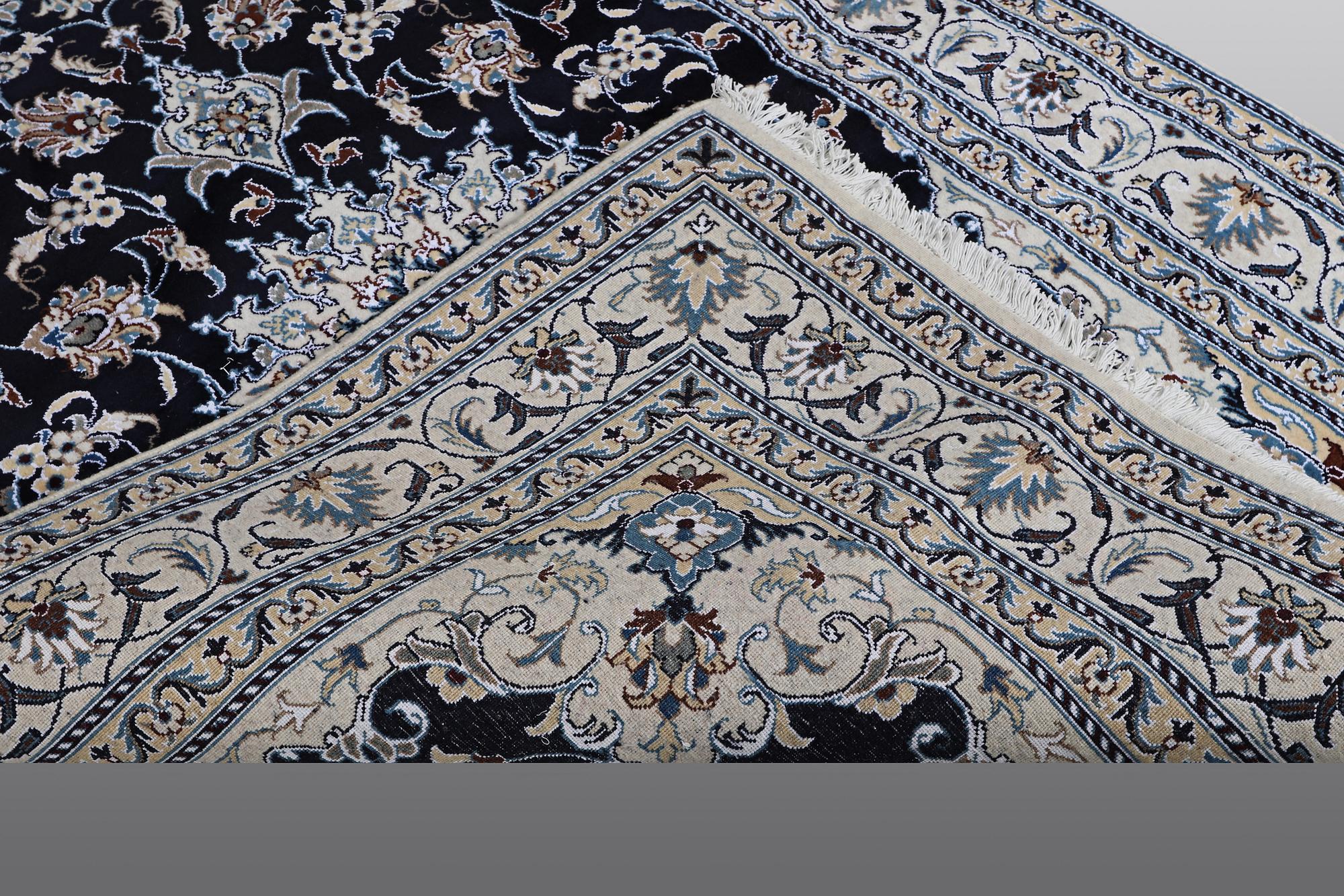 A carpet, Nain, part silk, ca 212 x 153 cm.