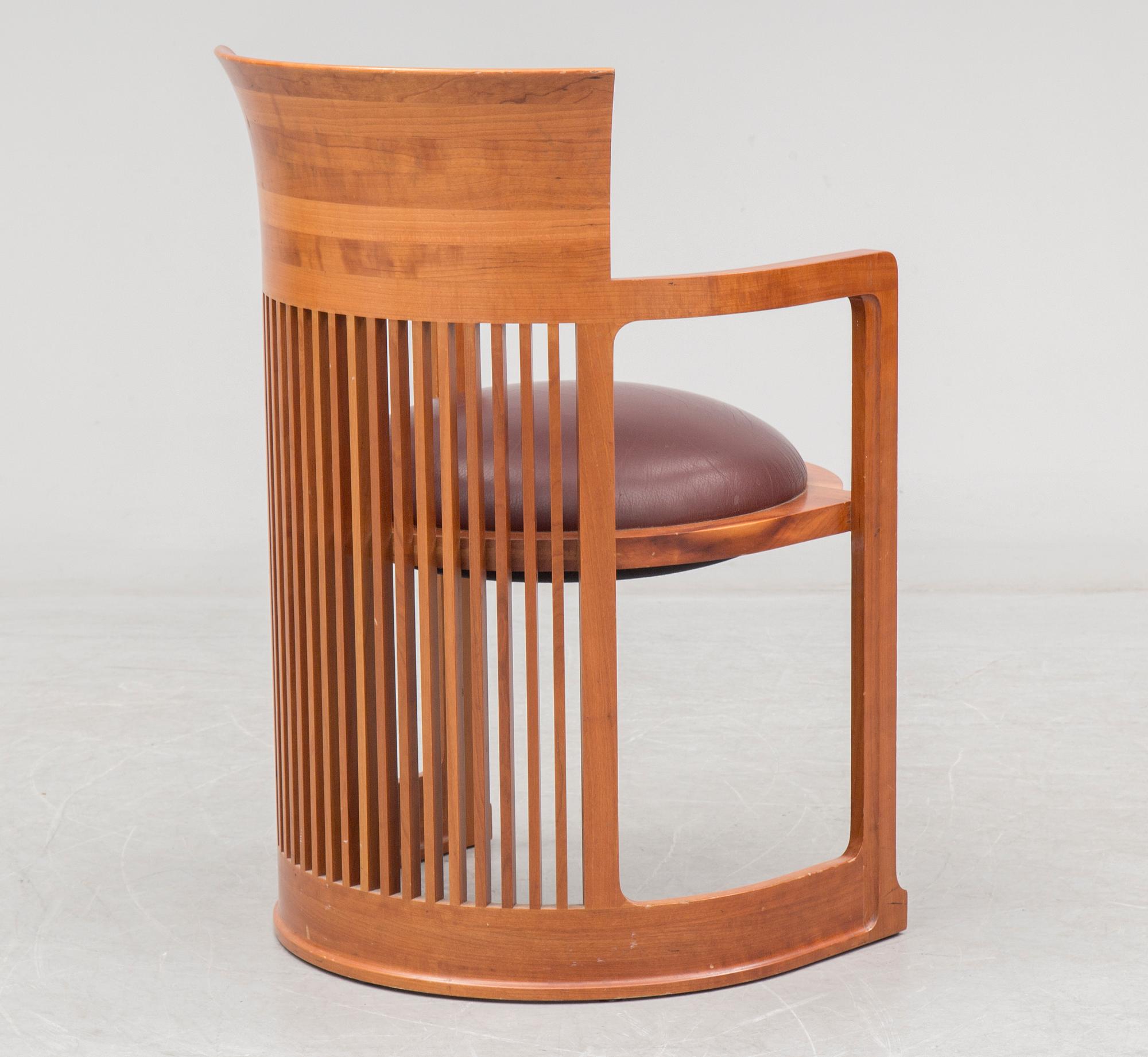 FRANK LLOYD WRIGHT, A cherry wood 'Barrel chair' from Cassina, late 20th century.