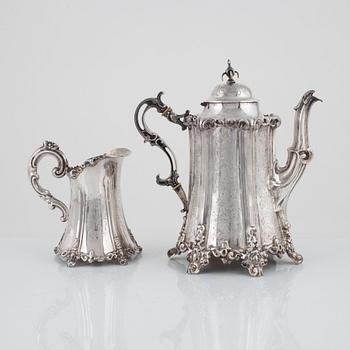 A Swedish Silver Rococo-Revival Coffee Pot and Creamer, mark of JT Palmgren, Norrköping 1859.
