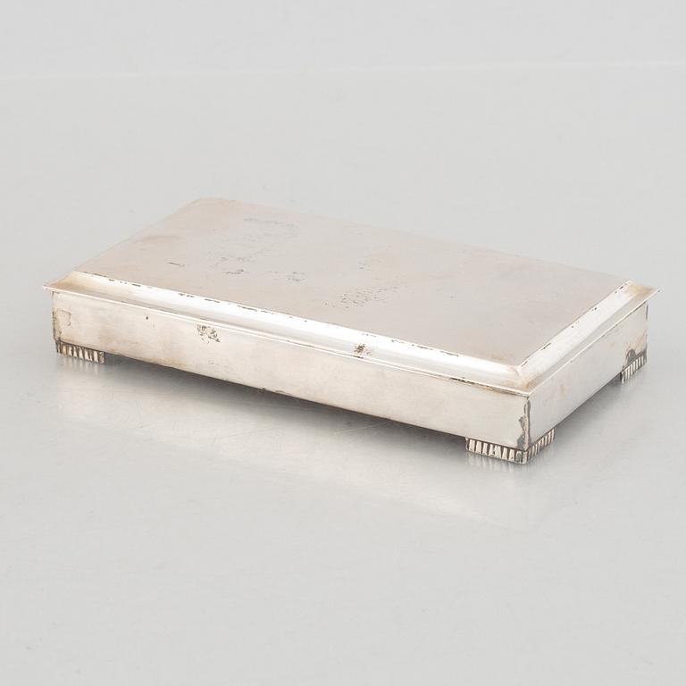 A Swedish silver beaker, an inkwell and a box, including Hugo Grun & Co, Stockholm 1948.