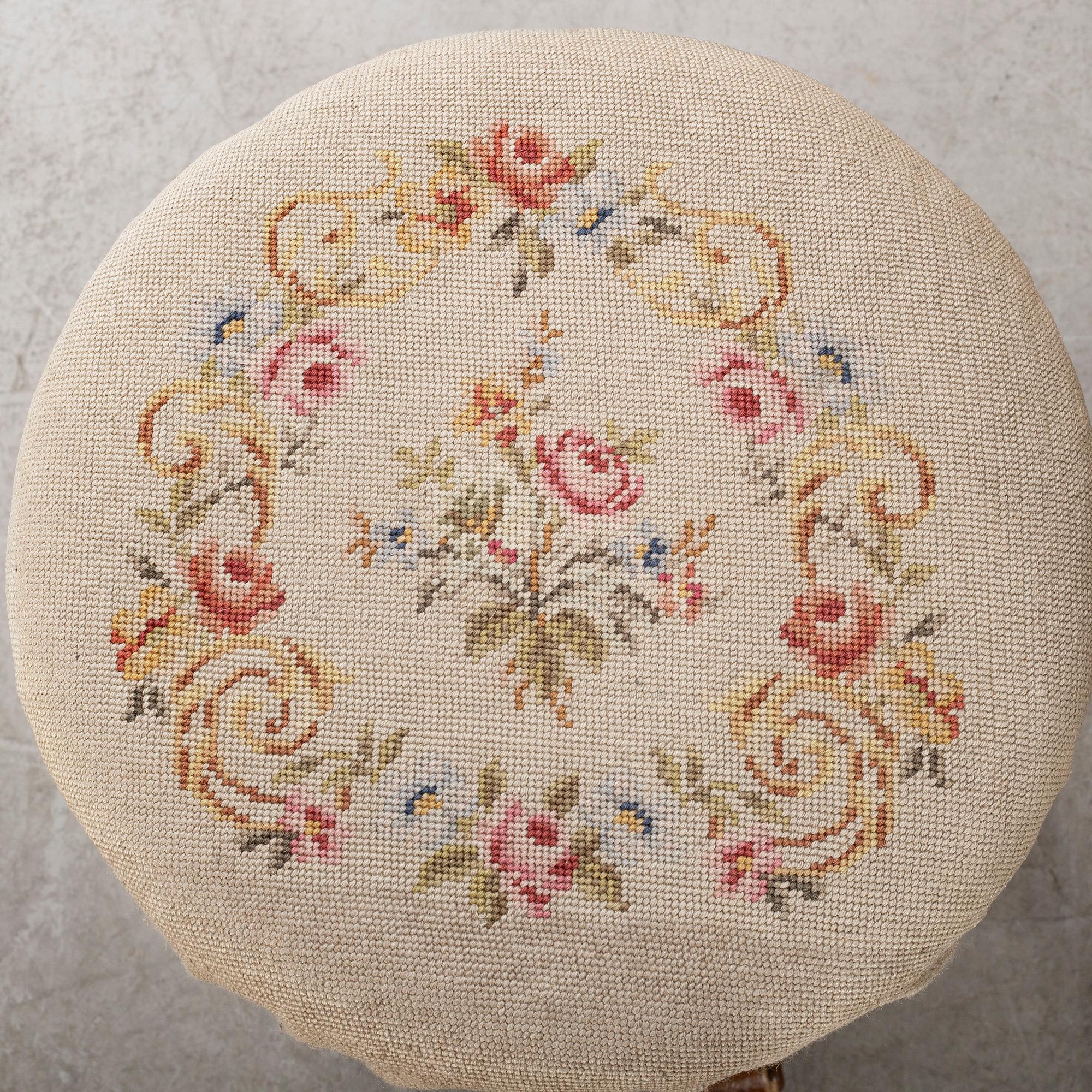 A second half of the 19th century table with mirror and a stool.