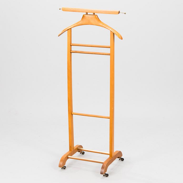An Italian Fratelli Reguitti valet stand, the latter half of 20th century.