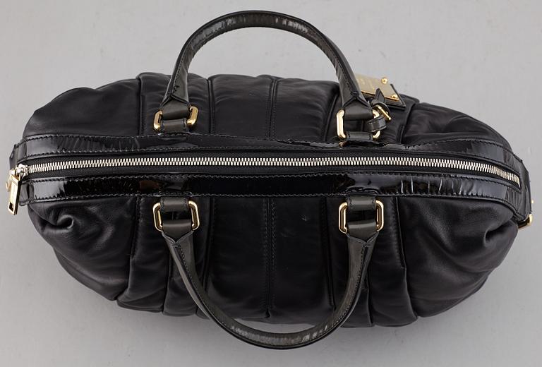 DOLCE & GABBANA, a black leather bag.