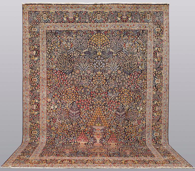 A carpet, Kerman, ca 420 x 298 cm.