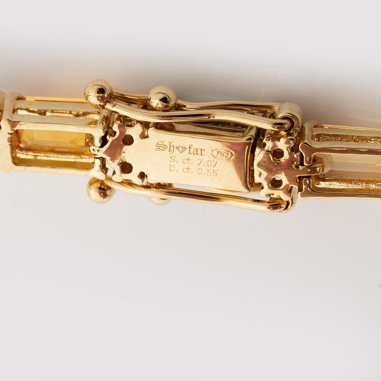 Bracelet 18K gold with multi-coloured sapphires and round brilliant-cut diamonds.