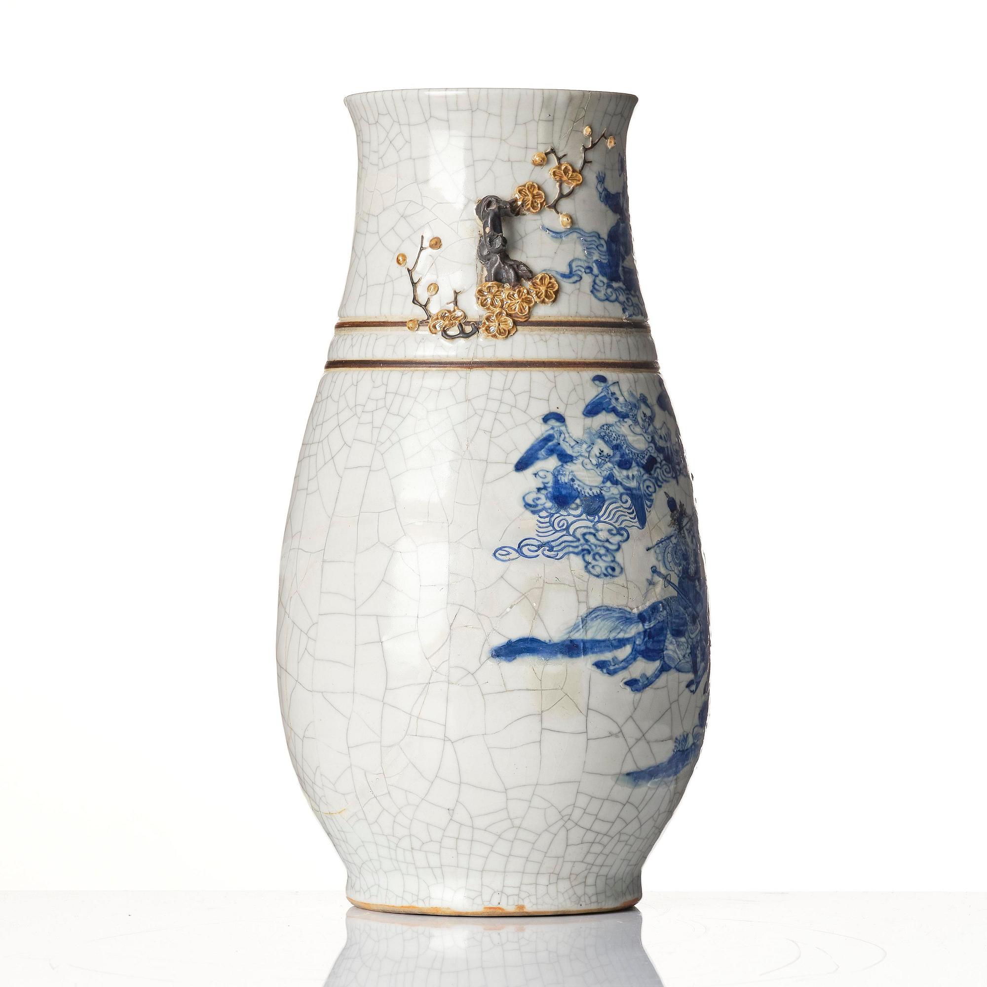 An underglaze blue and enamelled vase, Qing dynasty, 19th century.
