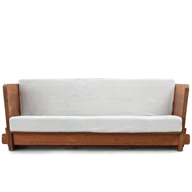 Axel Einar Hjorth, a stained pine "Lovö" sofa, Nordiska Kompaniet, Sweden 1930's.