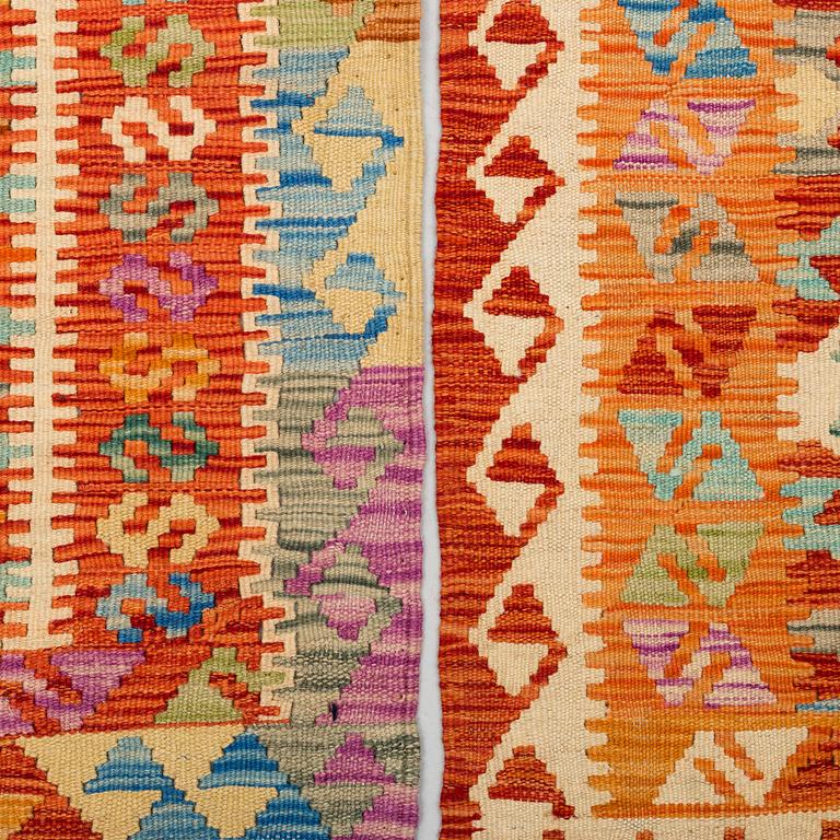 TWO KILIM RUGS 195 X 75
205 X 77 cm.