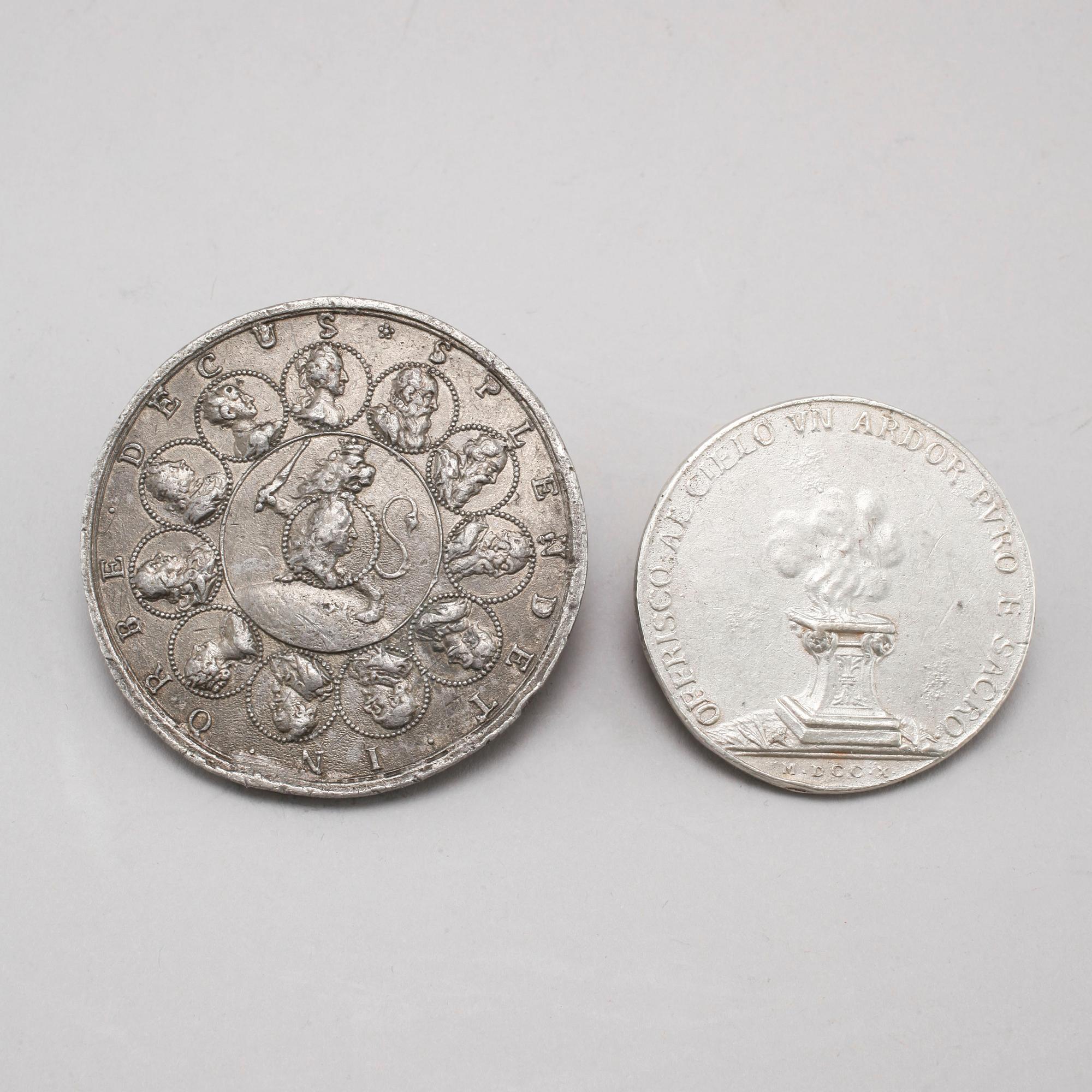 Two pewter medallions, 18th century.