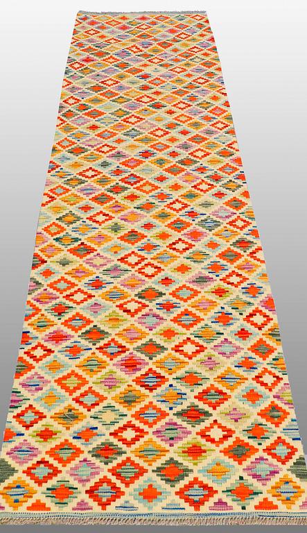 A runner Kilim, ca 300 x 77 cm.