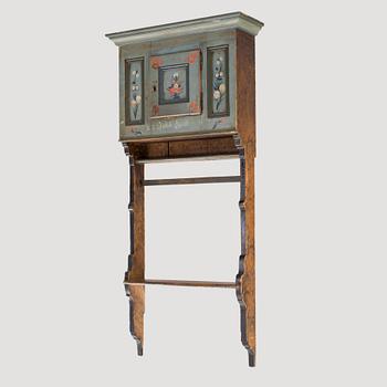 A 1700s hanging cabinet.