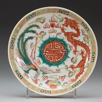 A set of three phoenix and dragon famille rose dish, Qing dynasty with Guangxu six character mark and period (1875-1908).
