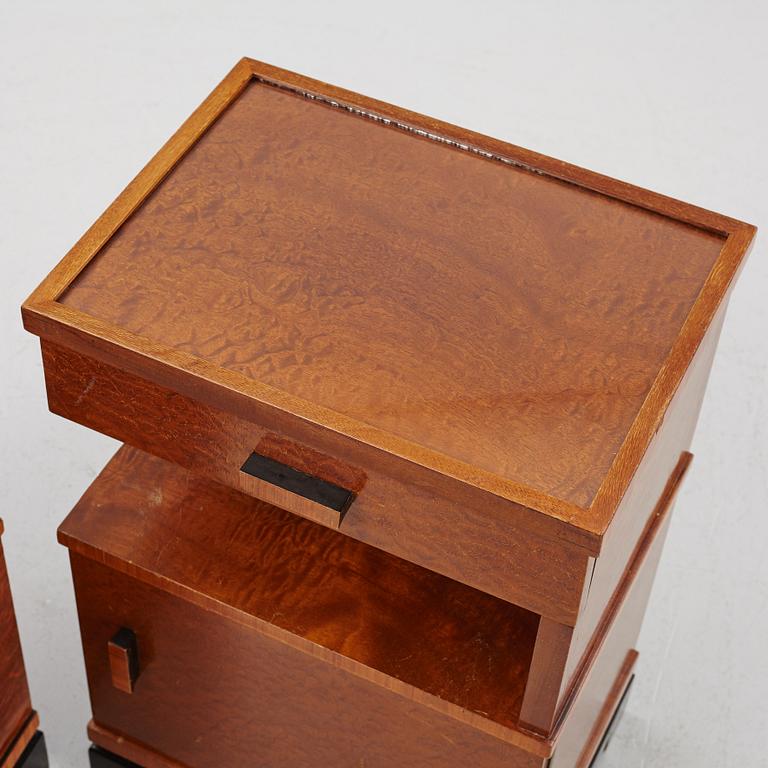 A pair of 1930's bedside tables.