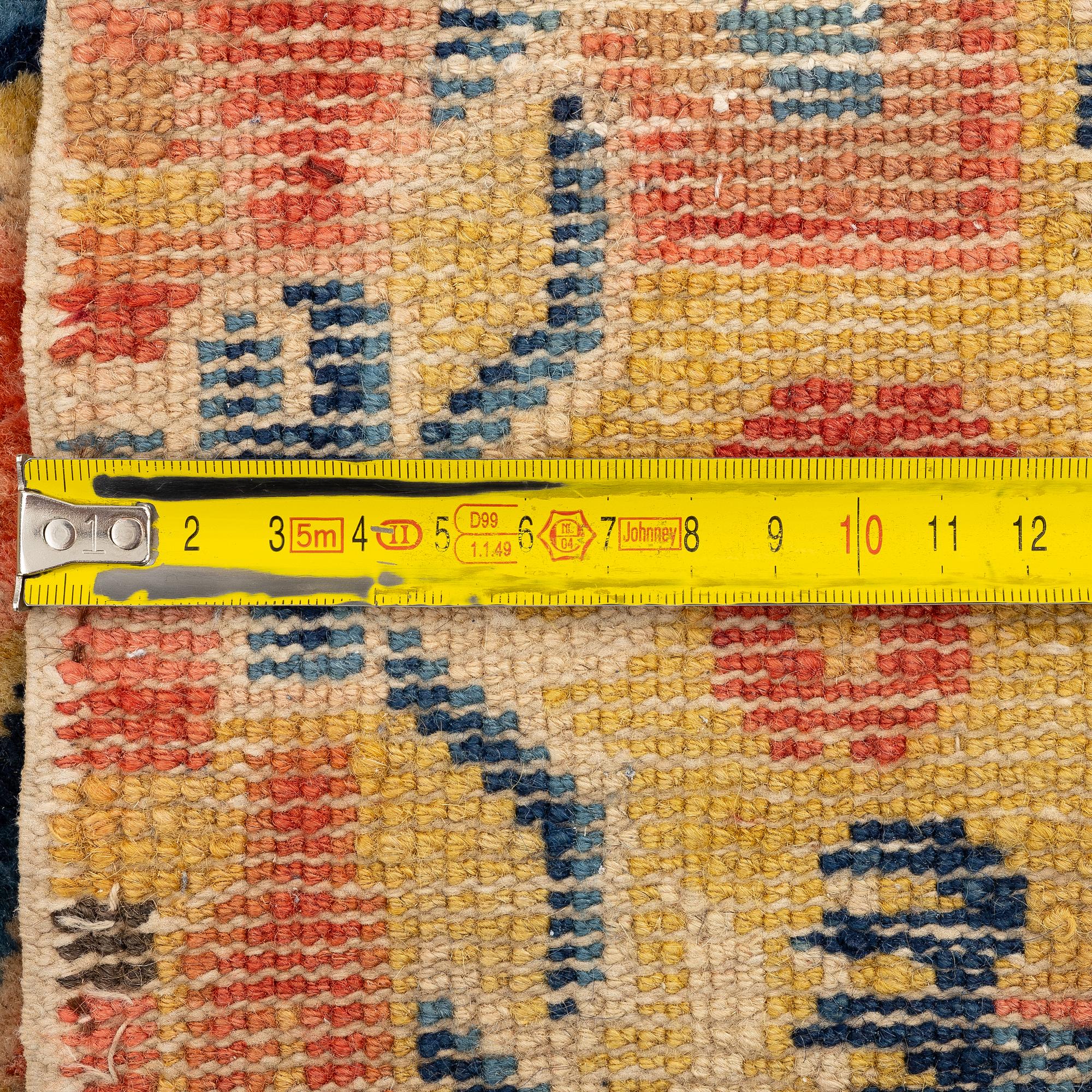 A Chinese antique Ningxia rug, late Qing dynasty, c. 128 x 67 cm.