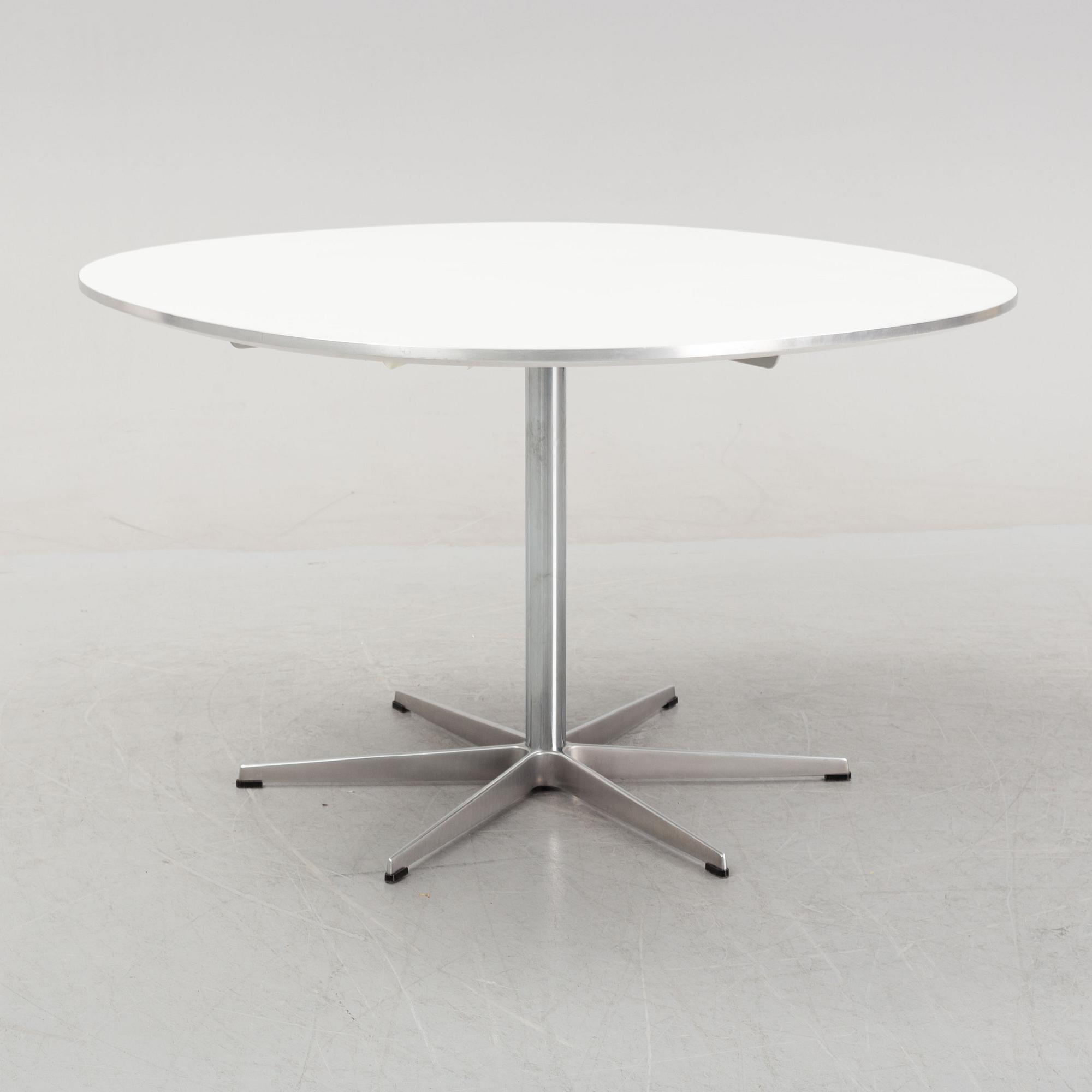 Arne Jacobsen, Bruno Mathsson & Piet Hein, a 'Supercircular' dining table from Fritz Hansen, designed 1968.