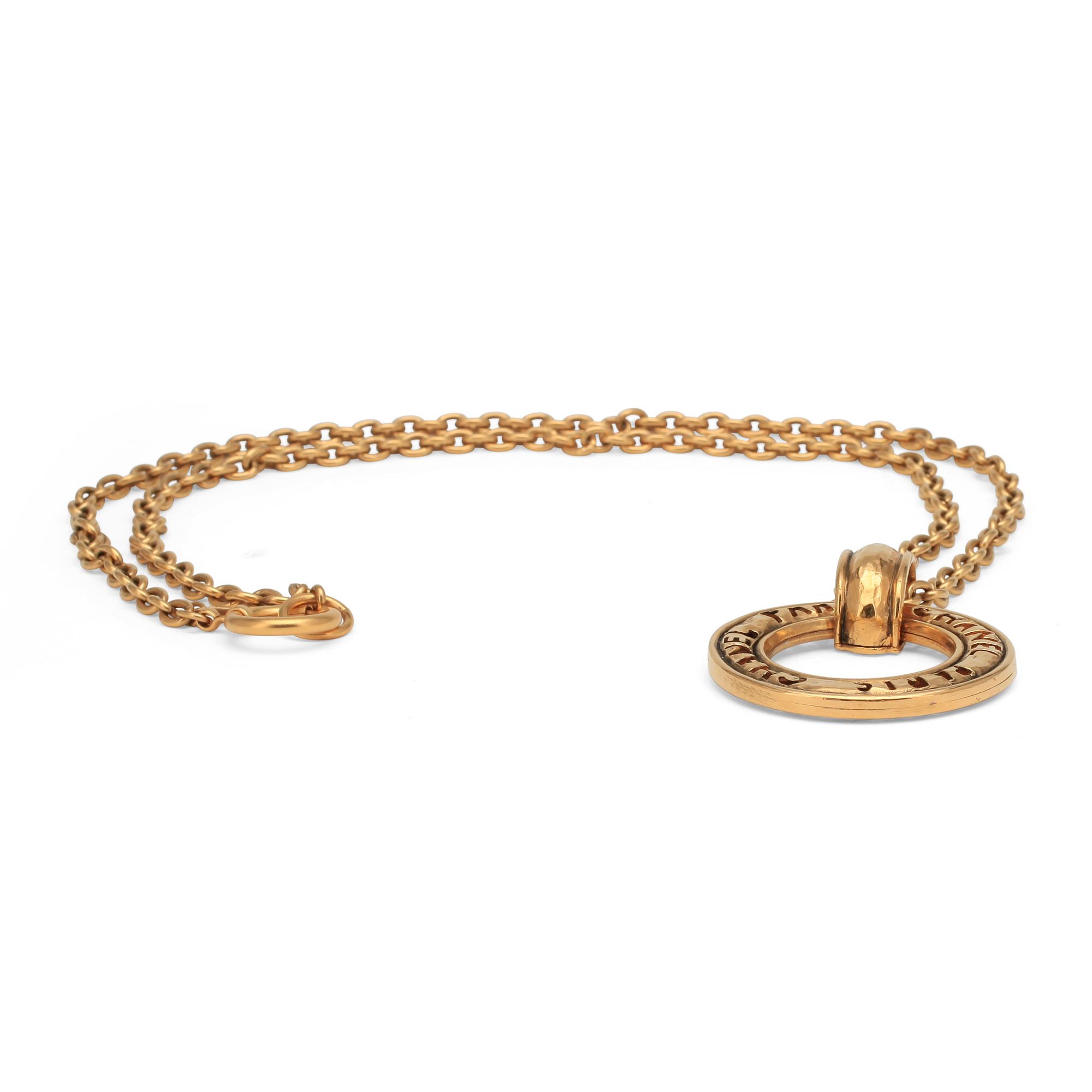 CHANEL, a necklace.