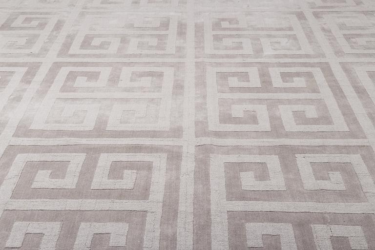 A Layered "Wool Cubes" carpet, 390x620 cm.