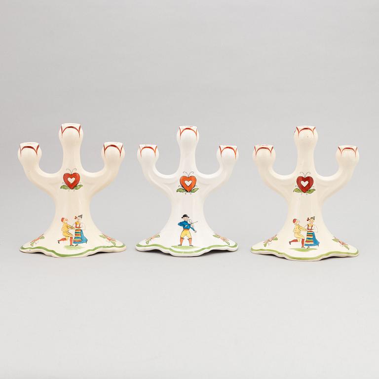 A set of three 'Daladansen' flintware candelabra from Rörstrand, Art Nouveau, early 20th Century.