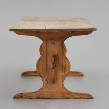 A pine trestle table, 20th century incorporating older elements.