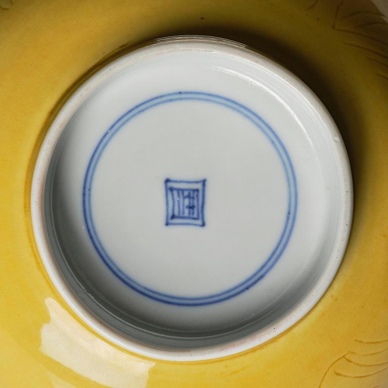 A yellow glazed 'prunus' bowl, Qing dynasty, 18th century.