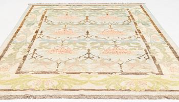A west persian carpet of C.F.A. Voysey Design, c. 351 x 249 cm.