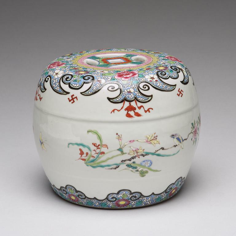 A small famille rose garden seat/stand, Qing dynasty, circa 1900.