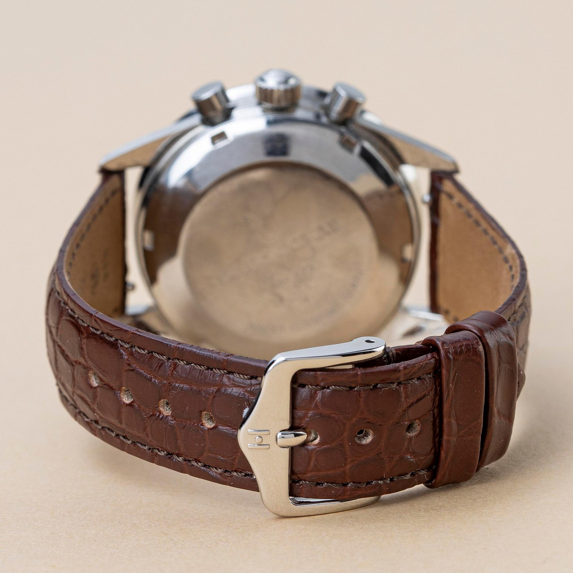 Universal Geneve, Compax 1950, "Baby Nina", "Burgundy", ca 1990.