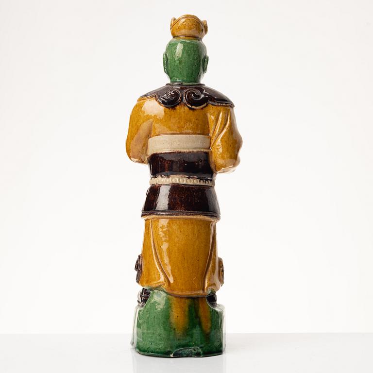 A stoneware figurine, China, Ming style but 20th century.