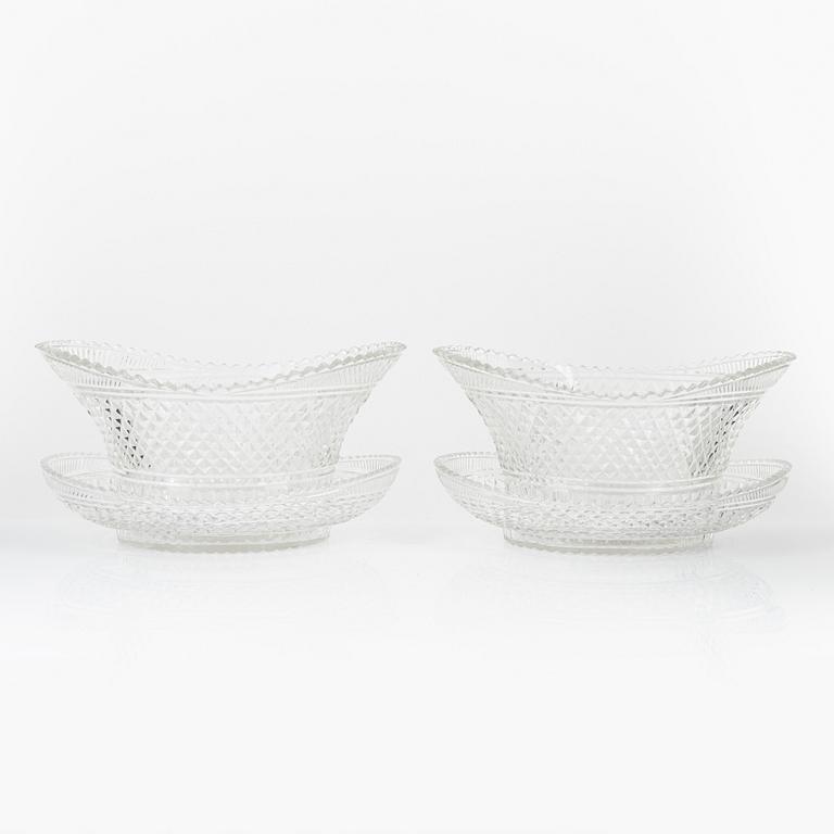 A pair of cut glas jardiieres on stands, 19th Century.
