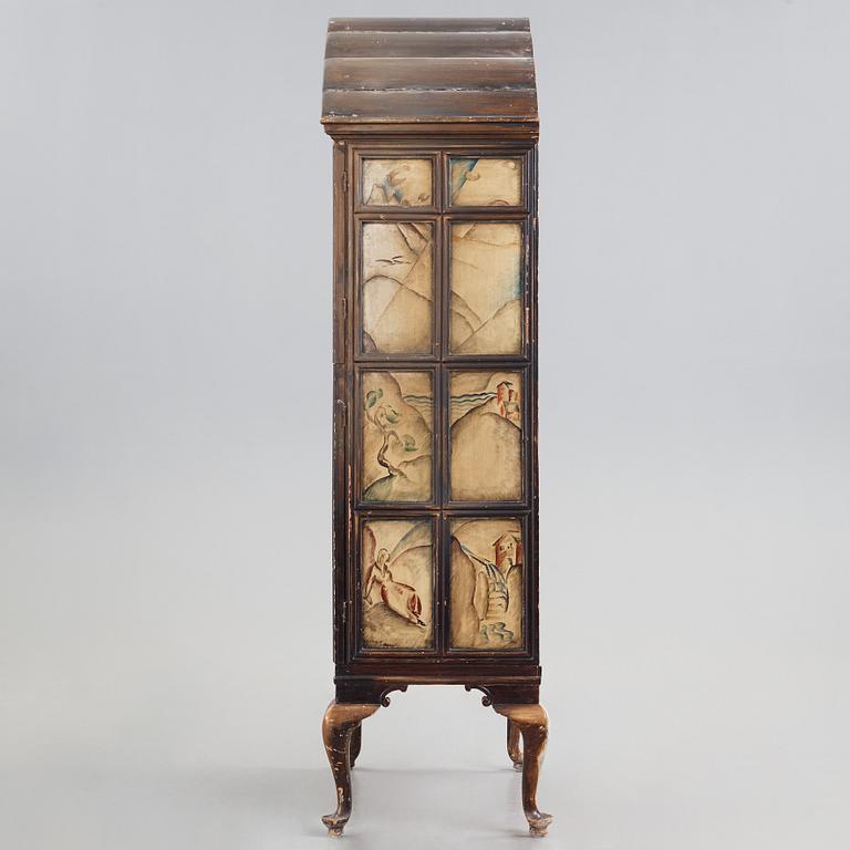 Tor Hörlin, a Swedish Grace decorated oak cabinet, dated 1920.