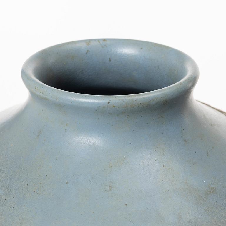 A blue glazed relief vase, possibly Korea, around 1900.