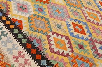 A kilim carpet, ca 486 x 304 cm.