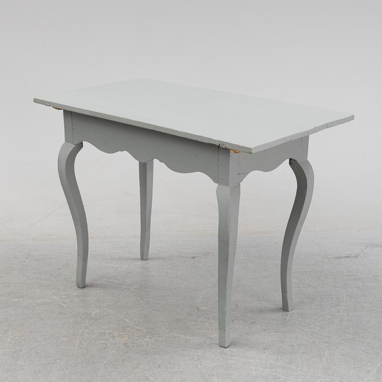 A painted rococo table, 18th Century.