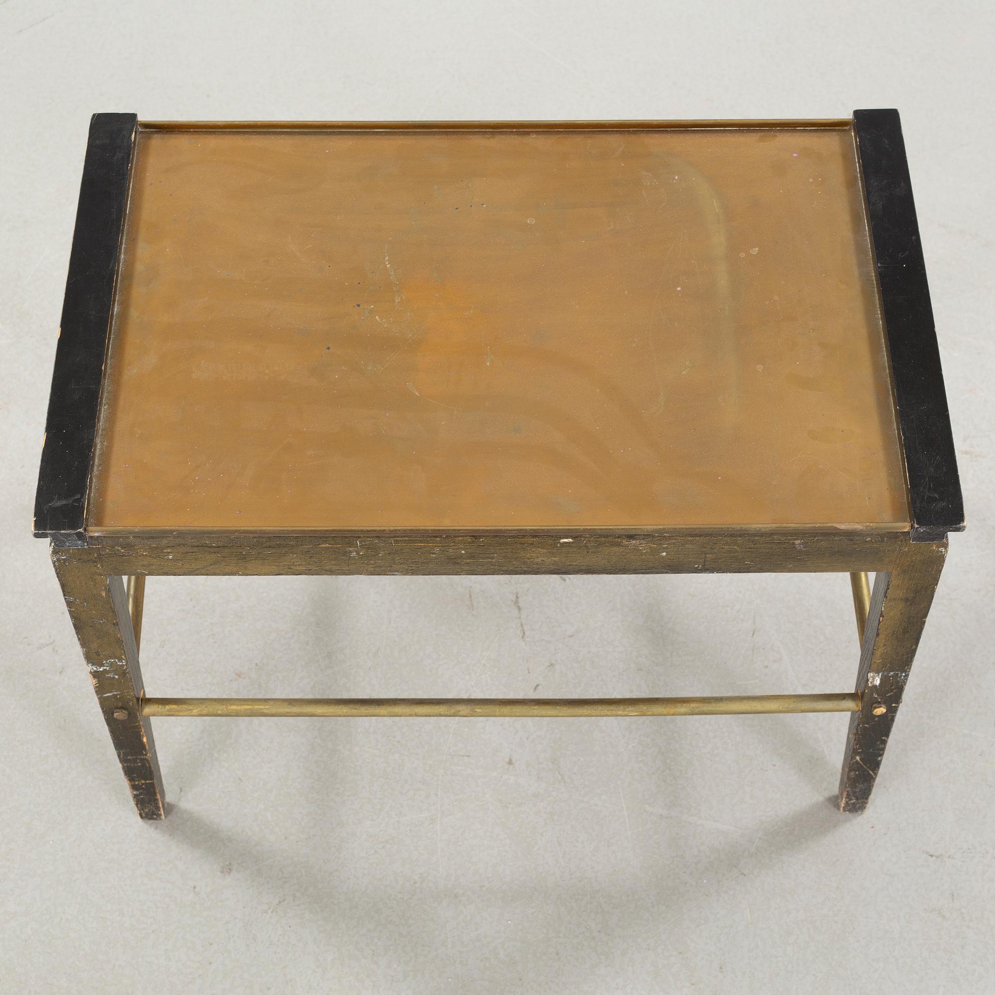 A tray table from the first half of the 20th century by Ystad Brons.