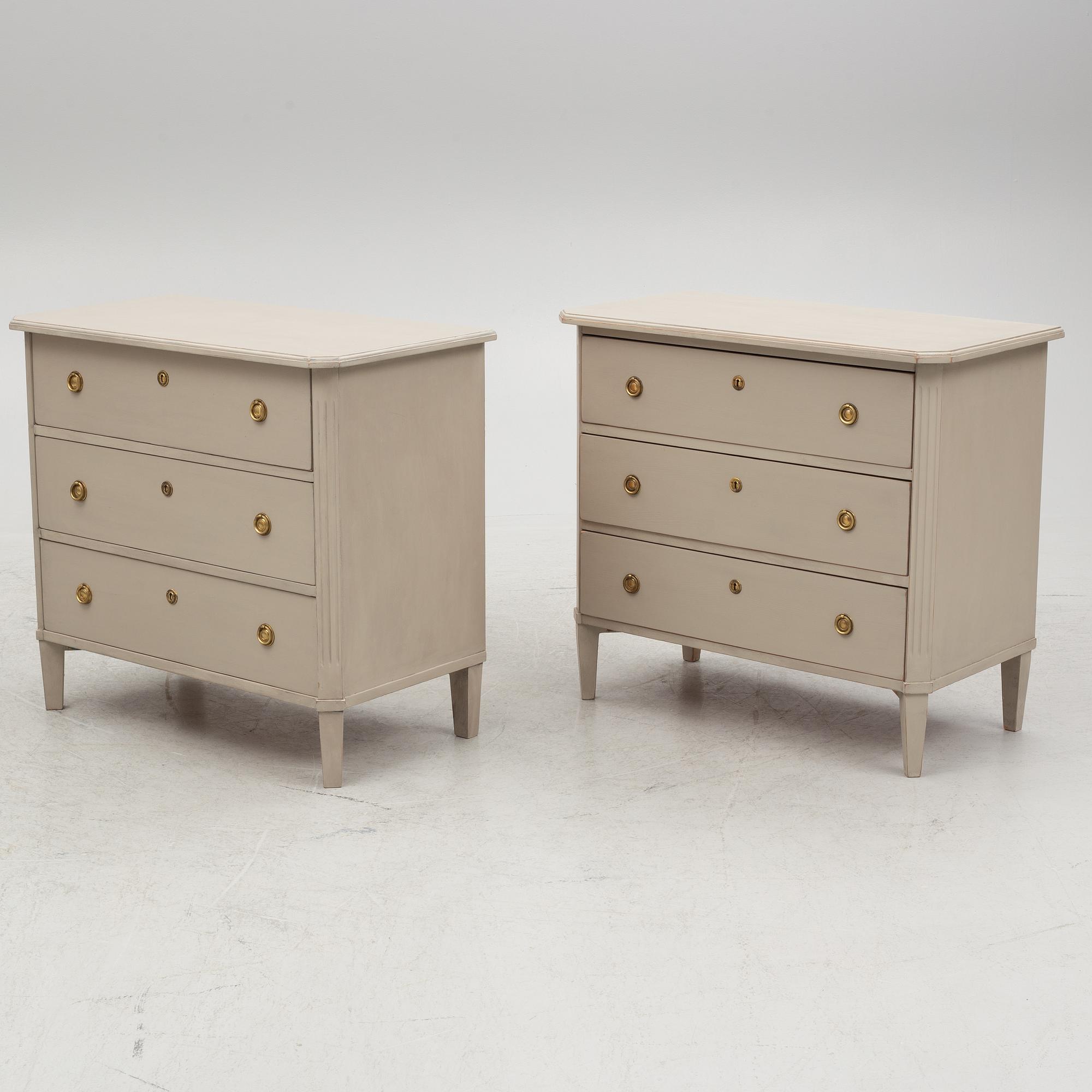 A pair of Gustavian style chest of drawers, mid 20th Century.