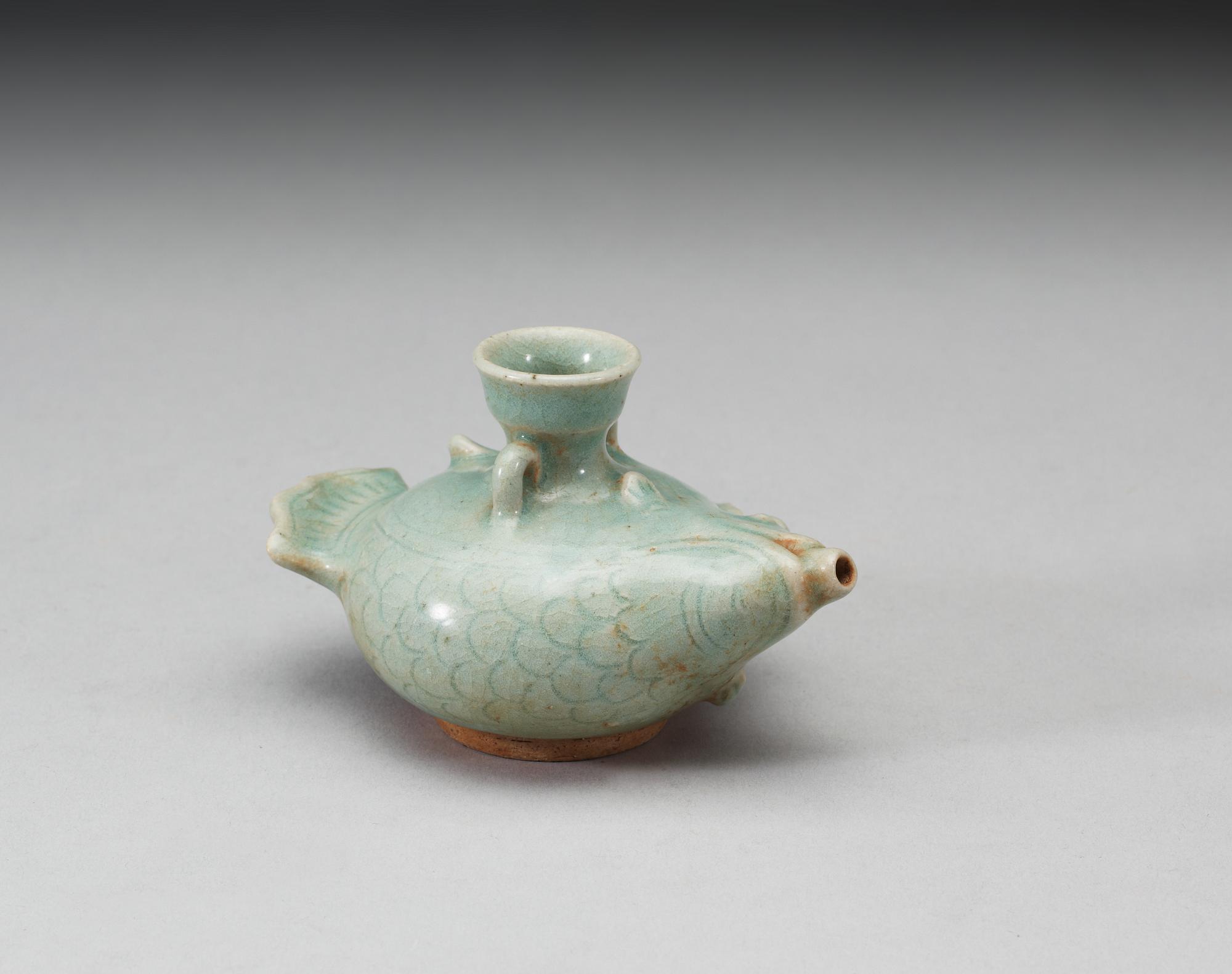 A celadon glazed water-dropper/water pot, Yuan dynasty (1271-1368).
