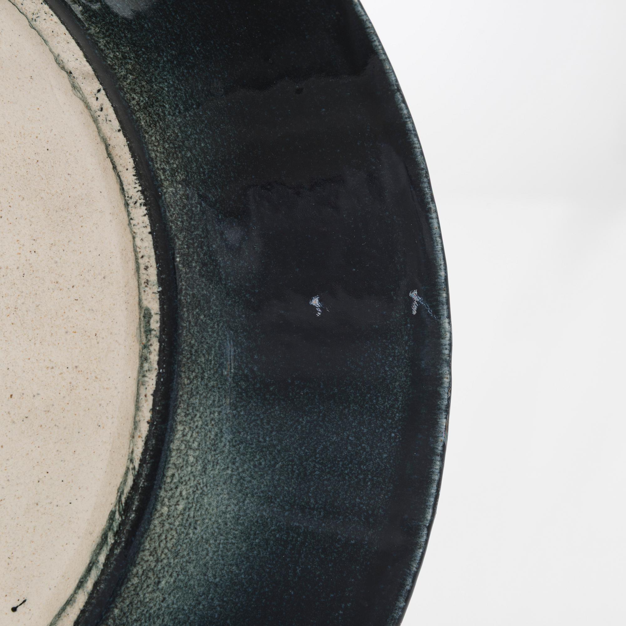 Birger Kaipiainen, a stoneware decorative dish signed Kaipiainen Arabia.