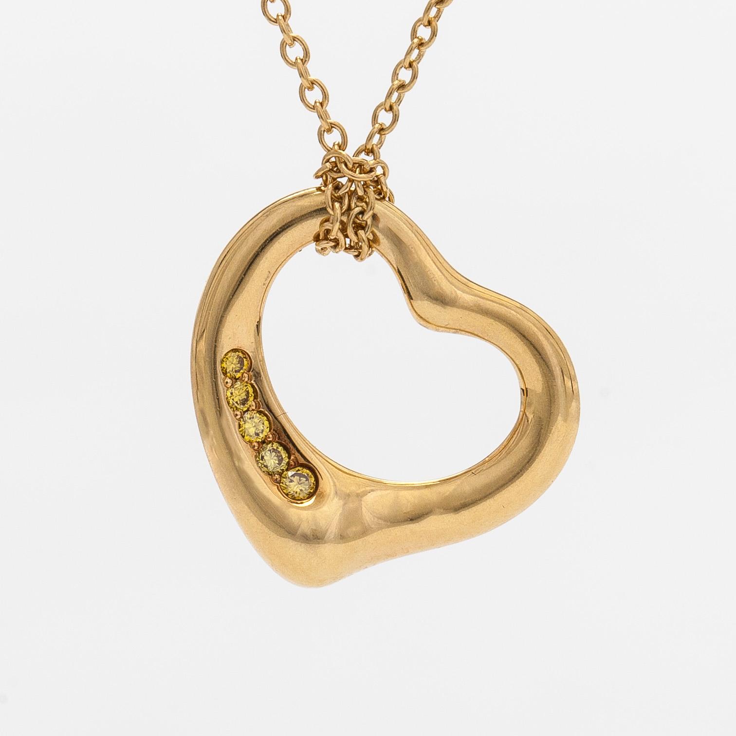 Tiffany & Co, Elsa Peretti, halsband, "Open Heart", 18K guld och gula diamanter.