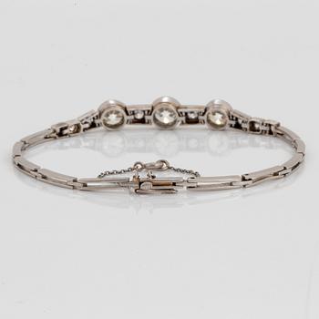 A platinum bracelet set with three old-cut diamonds with a total weight of ca 3.25 cts.
