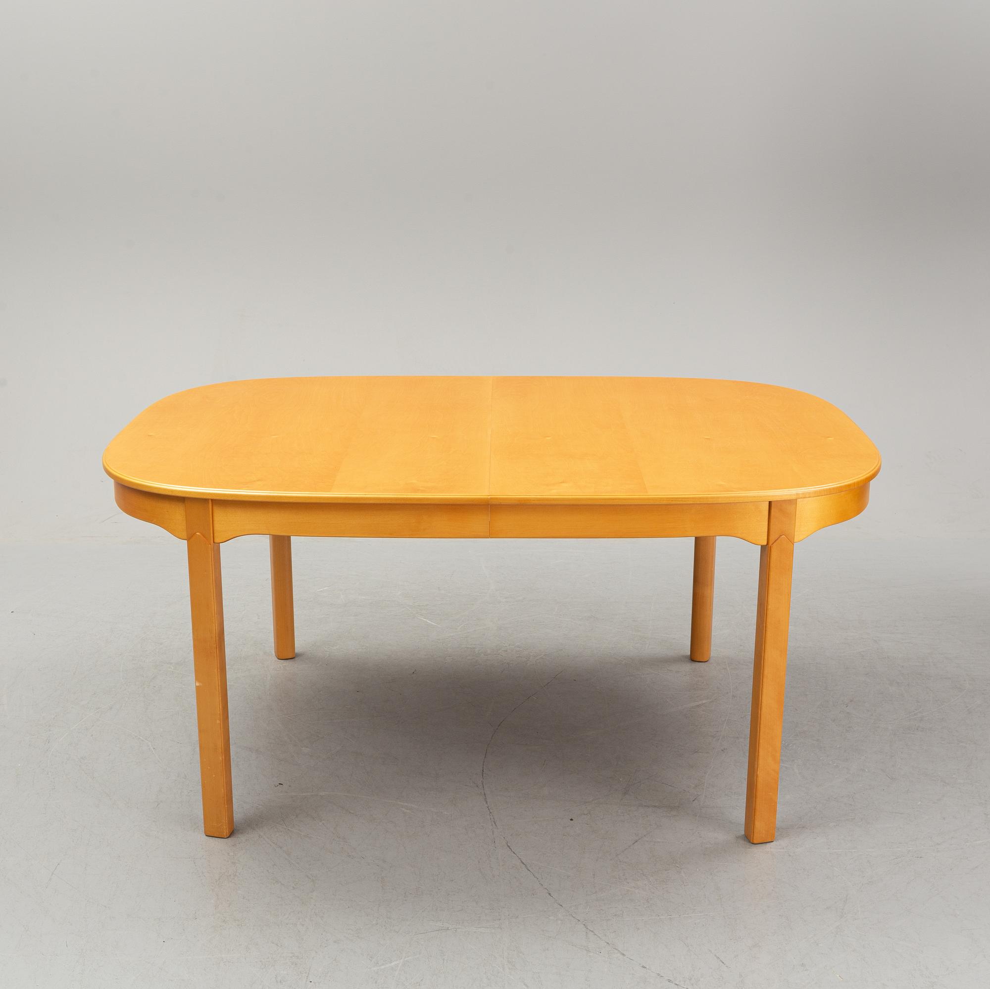 A Carl Malmsten 9-peice "Ambassaör" birch dining suite. Åfors Möbelfabrik.