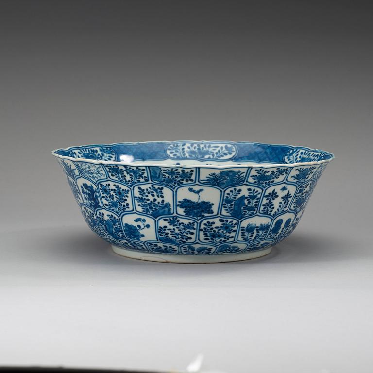 A blue and white punch bowl, late Qing dynasty with Kangxi six character mark.