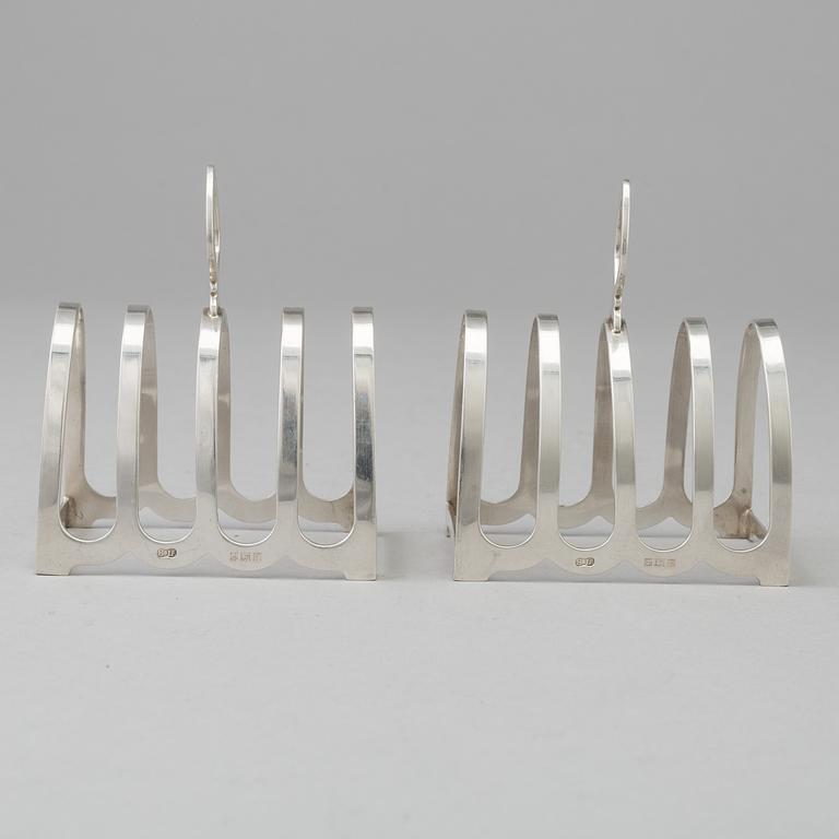 a pair of silver toastracks by William Suckling, Birmingham 1956.