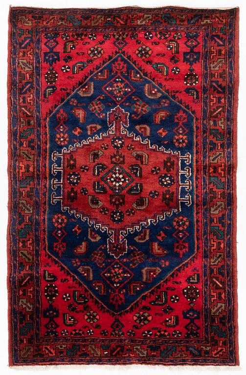 A carpet, circa 201 x 134 cm.