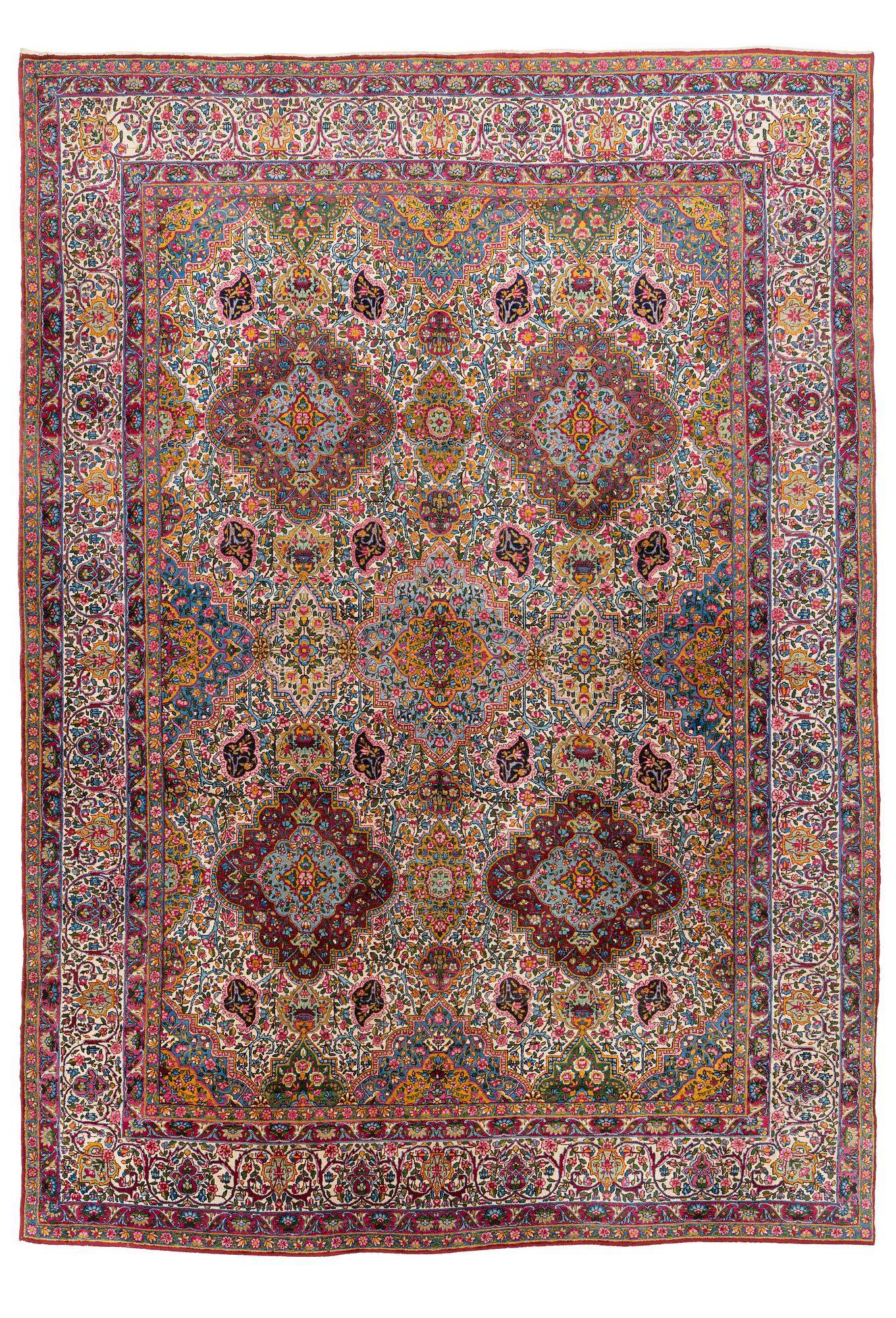 A semi-antique Kerman carpet, ca  402 x 291 cm.